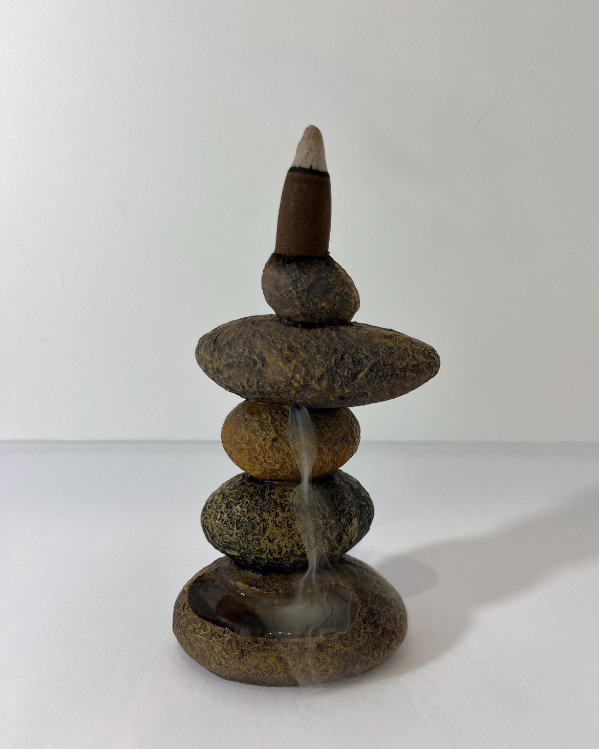 Flowing Rock Backflow Burner